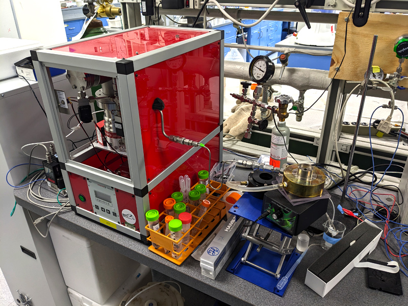 scientific instrument with tubes and wires.